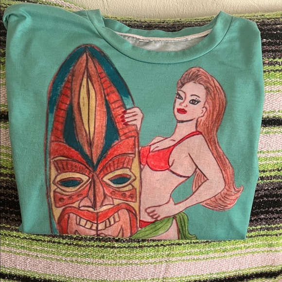 (S) Tiki woman Graphic T’shirt with Surfboard Designed by Julie Lee Nersinger - Picture 7 of 7